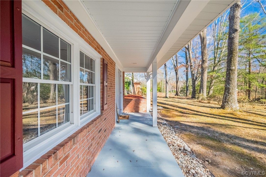 10240 Apache Road Richmond, VA 23235 - Photo 6 of 45 a view of a balcony with wooden floor