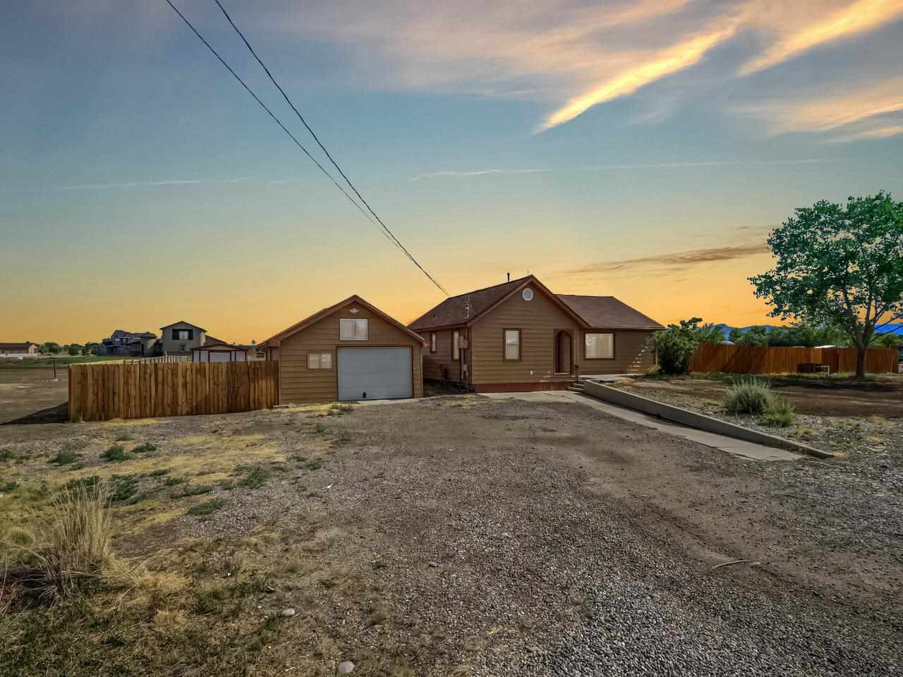 2278 H Road Grand Junction, CO 81505 - Photo 1 of 38 a view of a house with a yard