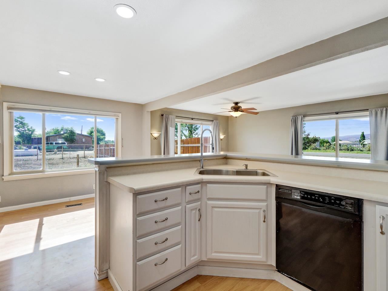 2278 H Road Grand Junction, CO 81505 - Photo 11 of 38 a kitchen with stainless steel appliances granite countertop a stove and a sink