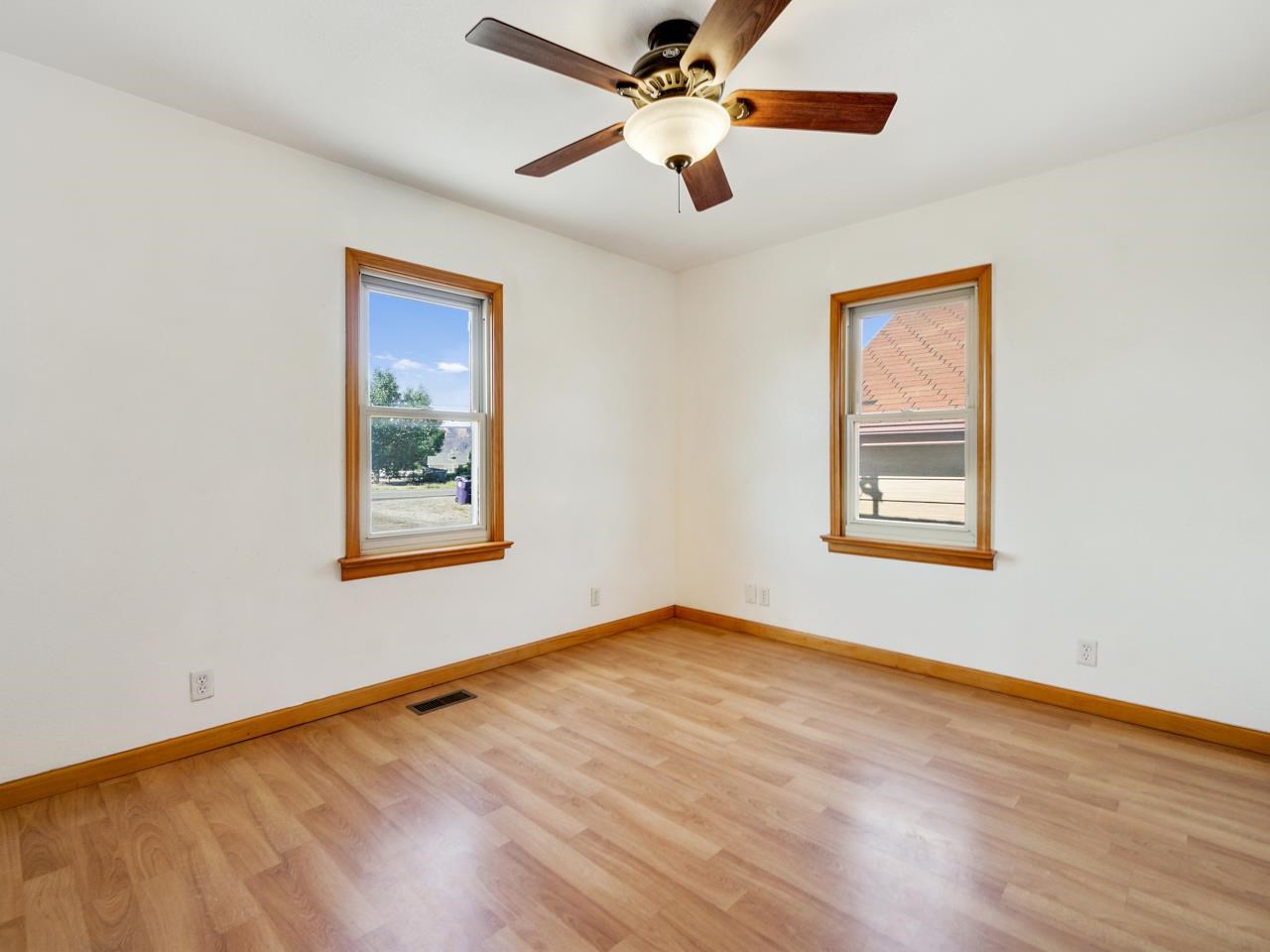 2278 H Road Grand Junction, CO 81505 - Photo 13 of 38 a view of an empty room with window and wooden floor
