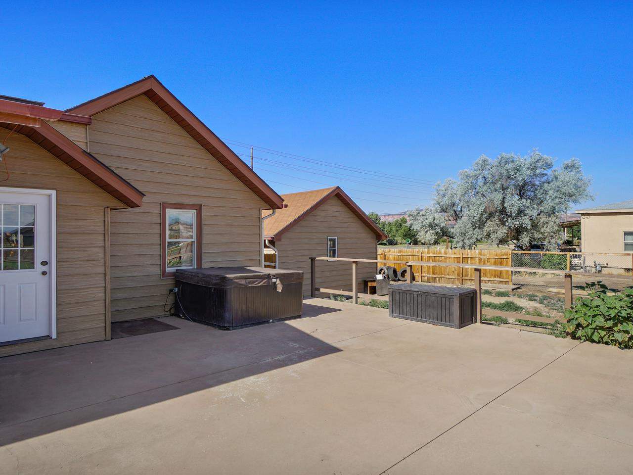 2278 H Road Grand Junction, CO 81505 - Photo 25 of 38 a view of house with backyard and trees in the background