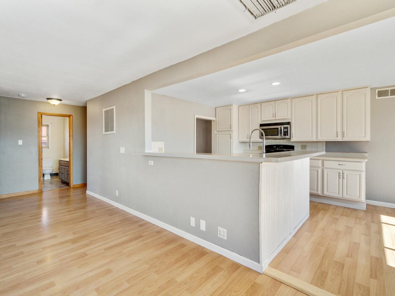 2278 H Road Grand Junction, CO 81505 - Photo 8 of 38 a view of a kitchen with wooden floor