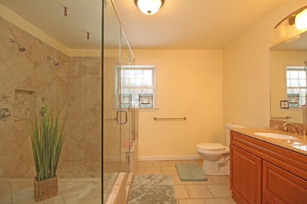 10 Cobb Hill Road Phillipston, MA 01331 - Photo 20 of 25 a bathroom with a granite countertop sink toilet and shower