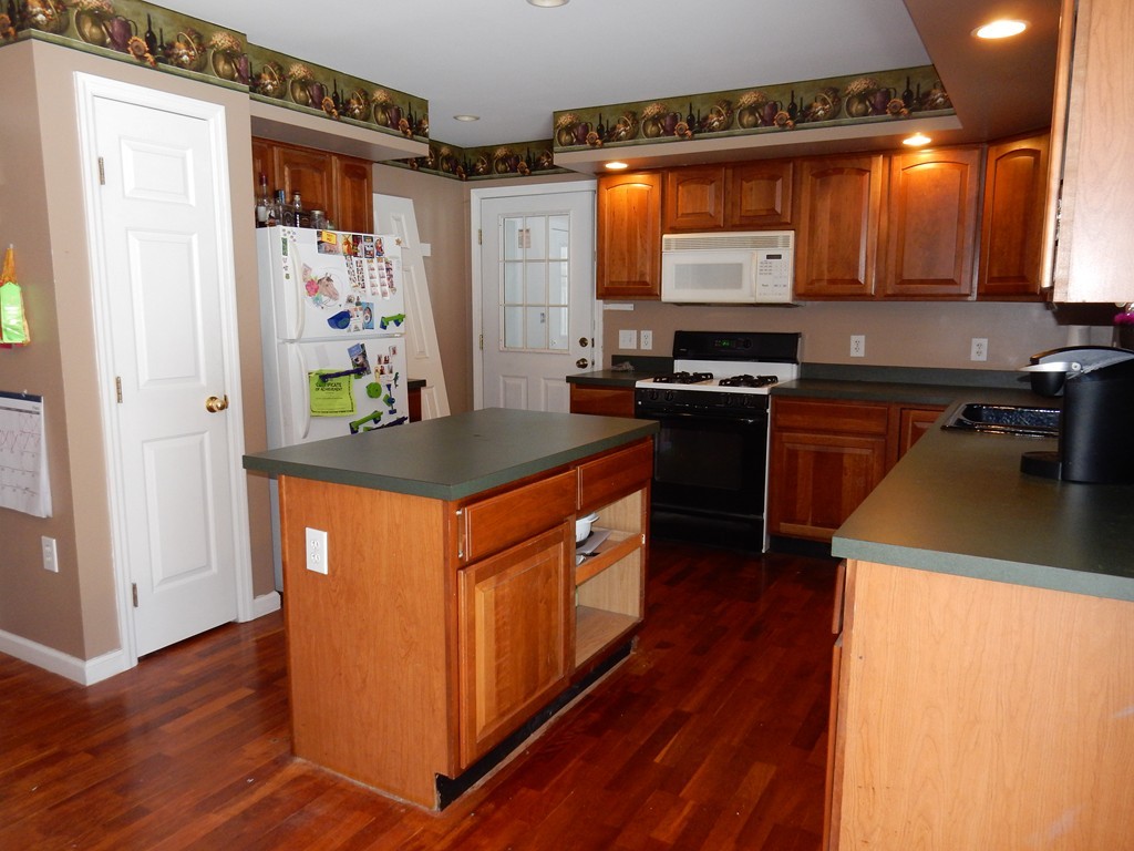 10 Cobb Hill Road Phillipston, MA 01331 - Photo 4 of 25 a kitchen with stainless steel appliances granite countertop a stove a sink and a refrigerator