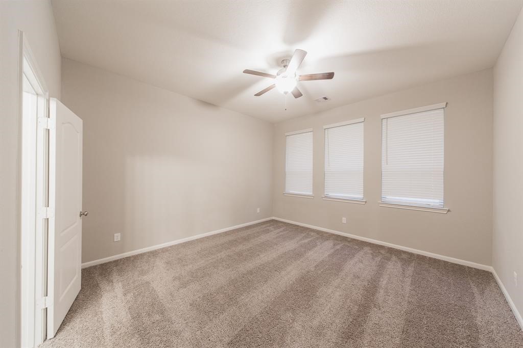 3219 Montclair Orchard Trace Spring, TX 77386 - Photo 13 of 27 a view of an empty room with a window