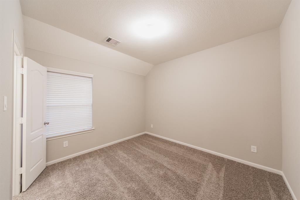 3219 Montclair Orchard Trace Spring, TX 77386 - Photo 21 of 27 a view of an empty room