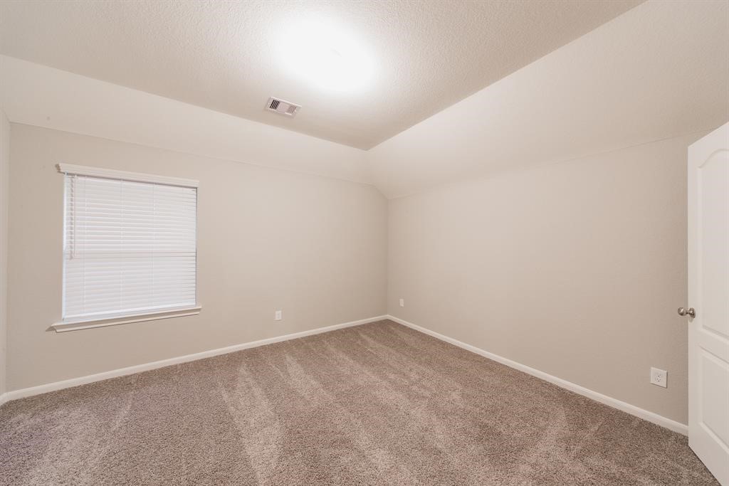 3219 Montclair Orchard Trace Spring, TX 77386 - Photo 24 of 27 an empty room with a window