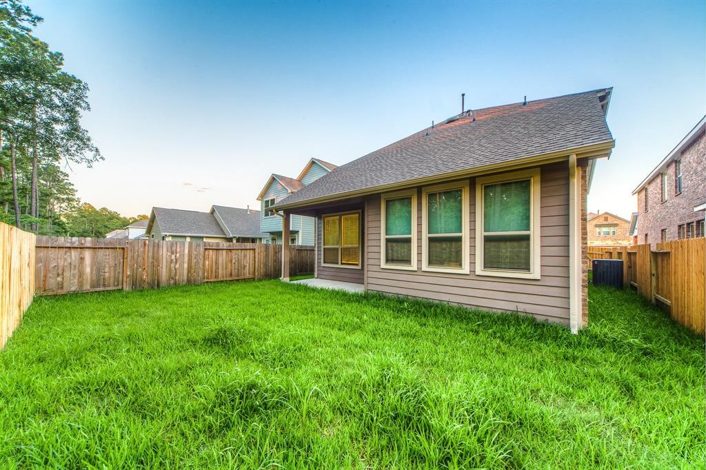 3219 Montclair Orchard Trace Spring, TX 77386 - Photo 26 of 27 a view of a house with yard in front of house