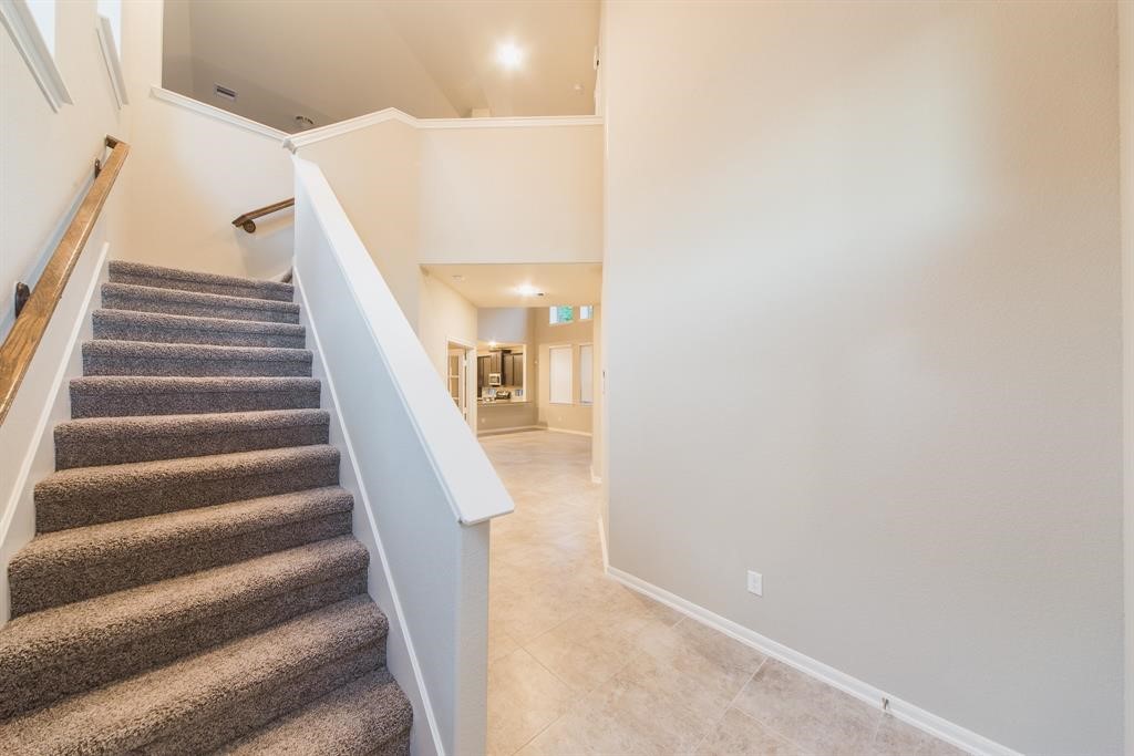 3219 Montclair Orchard Trace Spring, TX 77386 - Photo 3 of 27 a view of staircase with white walls