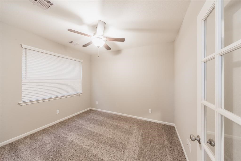 3219 Montclair Orchard Trace Spring, TX 77386 - Photo 5 of 27 a view of an empty room with a window