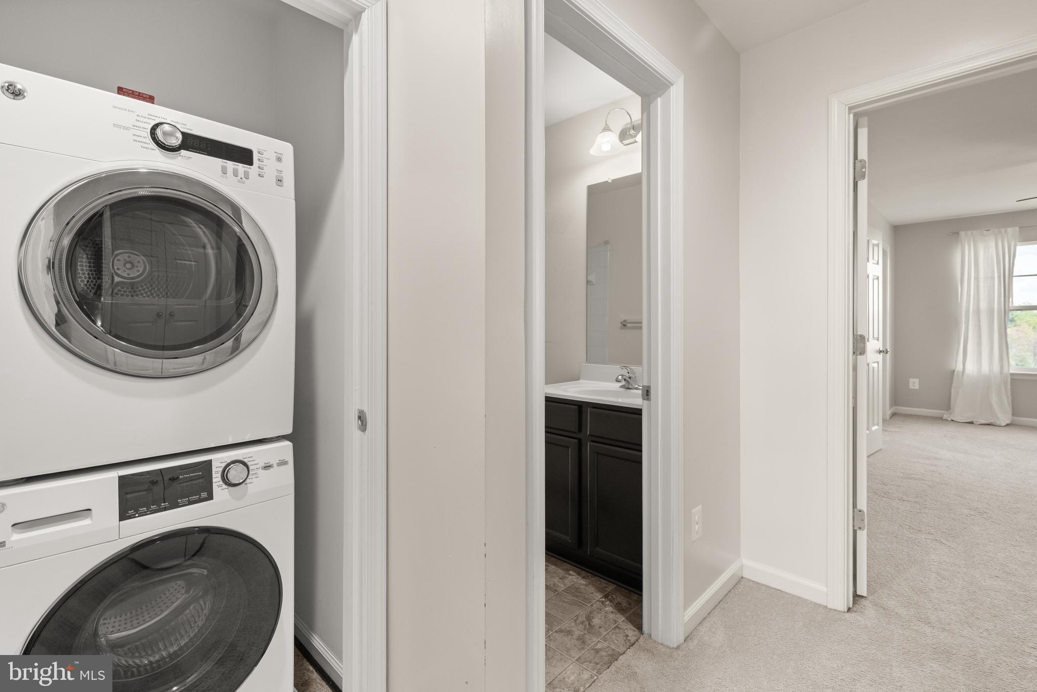 111 Rotunda Drive Stephenson, VA 22656 - Photo 26 of 33 a view of a hallway with washer and dryer