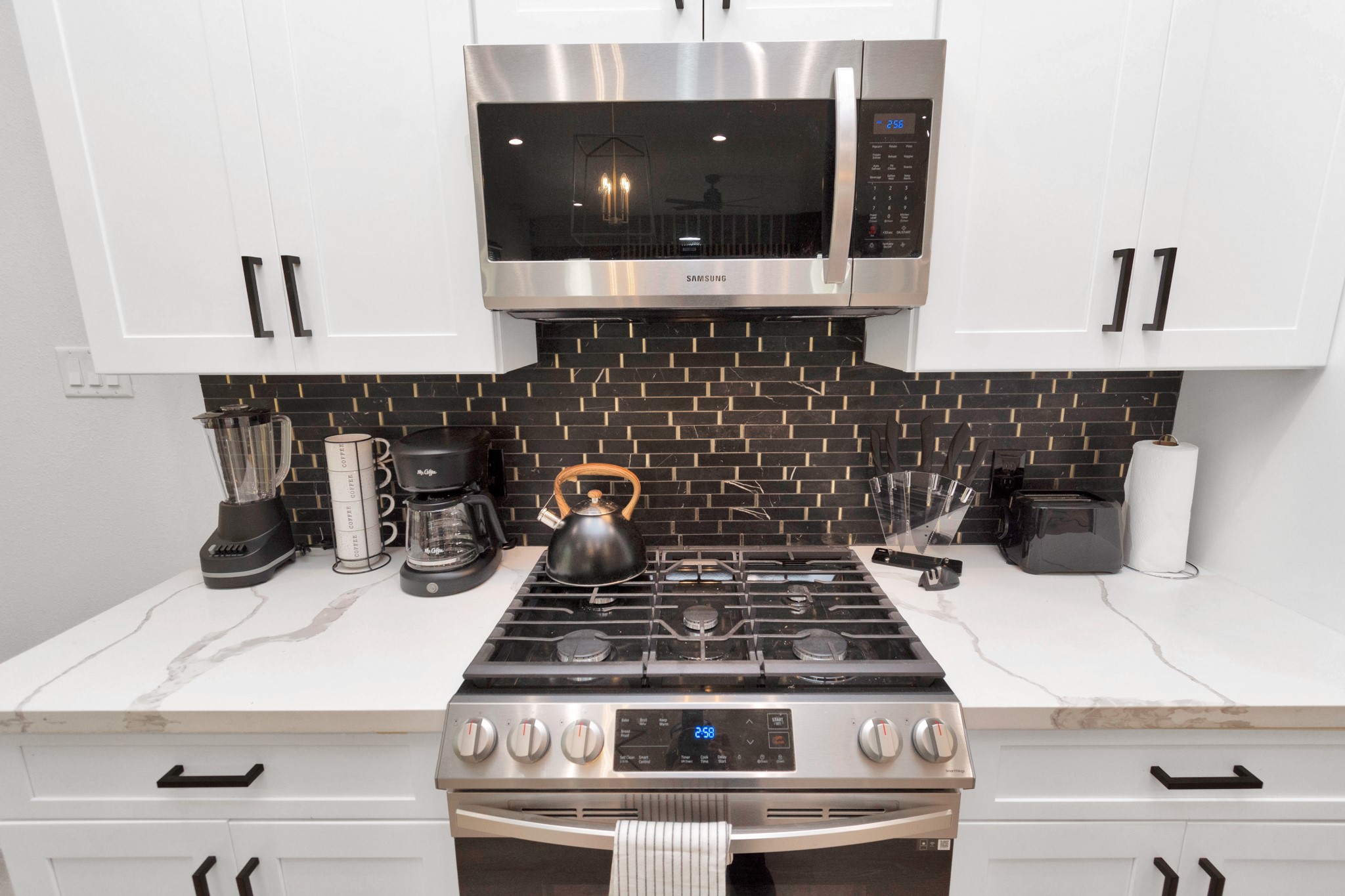 5308 Denmark Street Houston, TX 77028 - Photo 15 of 36 a stove top oven sitting inside of a kitchen