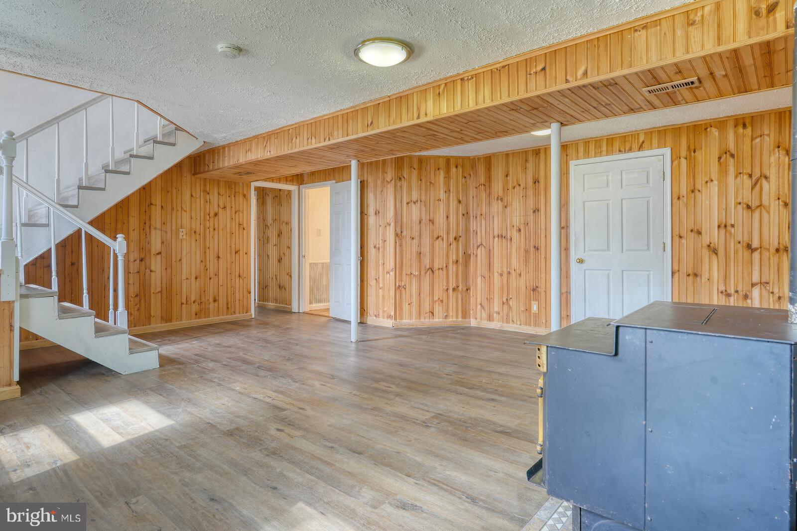 1142 Calvert Beach Road St. Leonard, MD 20685 - Photo 38 of 63 a view of an entryway with wooden floor
