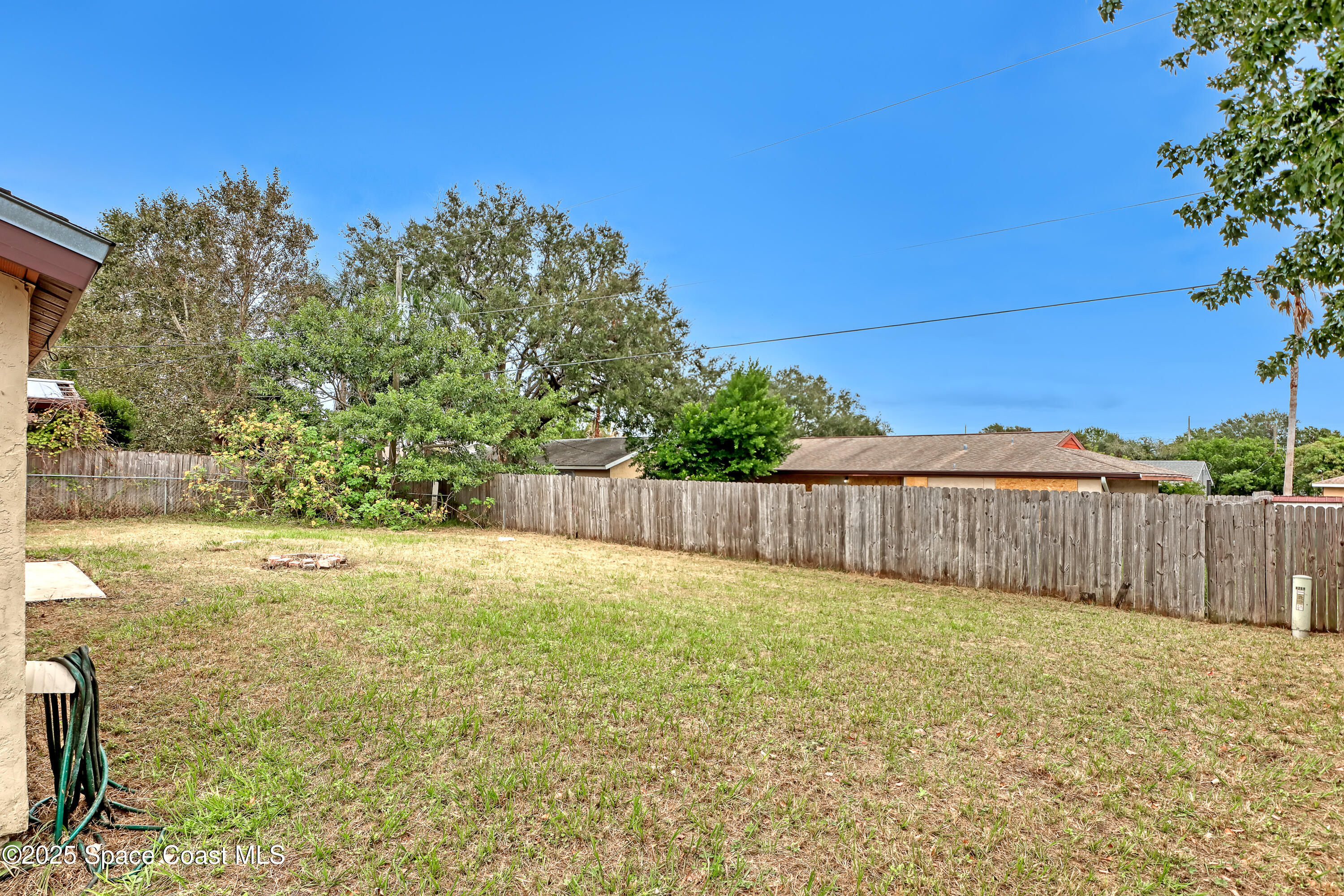 261 Chase Road Cocoa, FL 32927 - Photo 21 of 26 a view of a backyard of the house