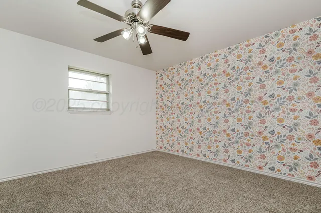 en empty room with windows