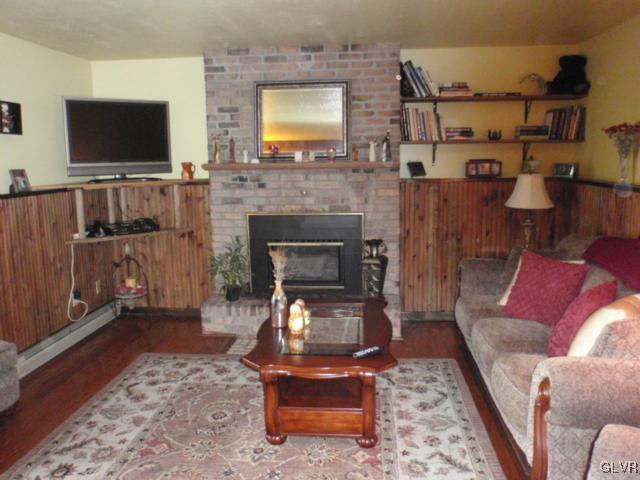 534 Mountain View Road Nazareth, PA 18064 - Photo 7 of 40 Family room with hardwood floors as gas propane in