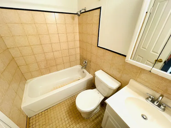 a bathroom with a sink and a bathtub
