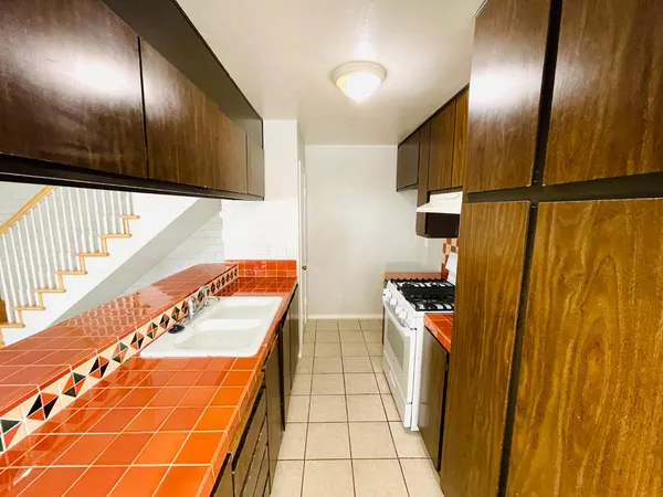 a hallway with cabinets