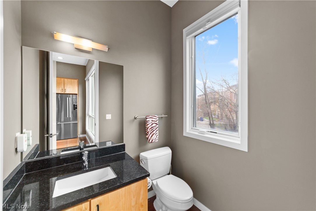 1868 Coltman Road Cleveland, OH 44106 - Photo 14 of 40 Bathroom featuring toilet and vanity