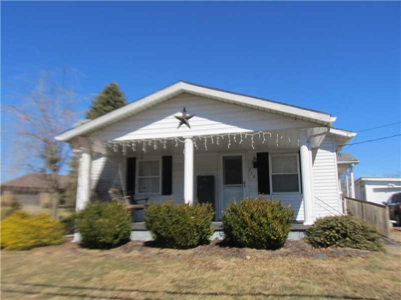 Exterior Front. Welcome to 712 Cemetery Road, Perryopolis, a 2 bedroom 1 bath ranch on 3/4 acre of level land