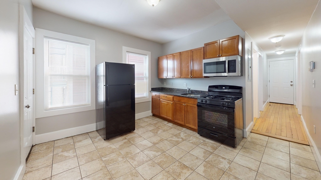 18 Rowell Street, Unit 2 Boston, MA 02125 - Photo 2 of 13