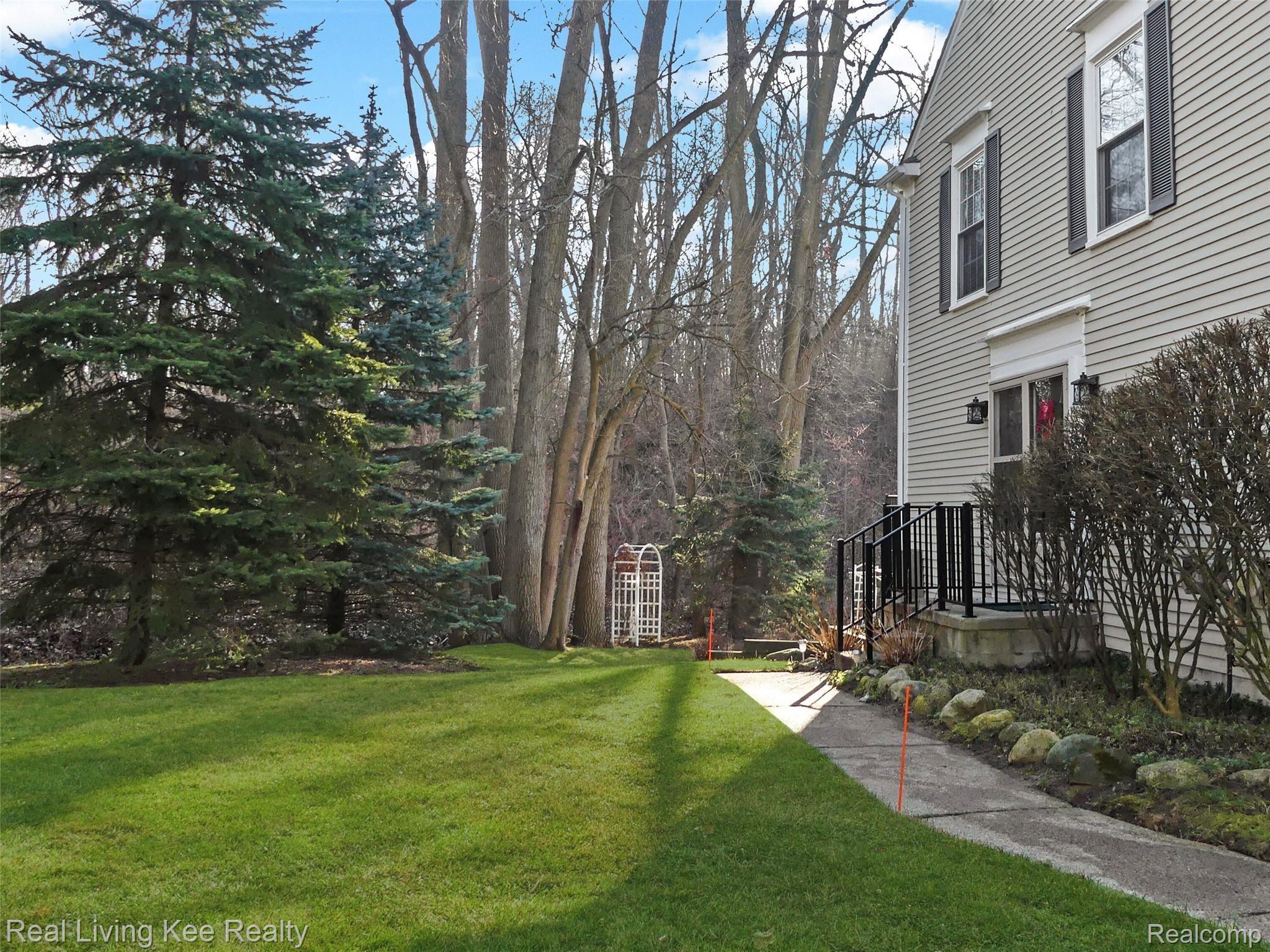 1326 Brook Lane Rochester, MI 48306 - Photo 3 of 47 Nicely landscaped with beautiful wooded views