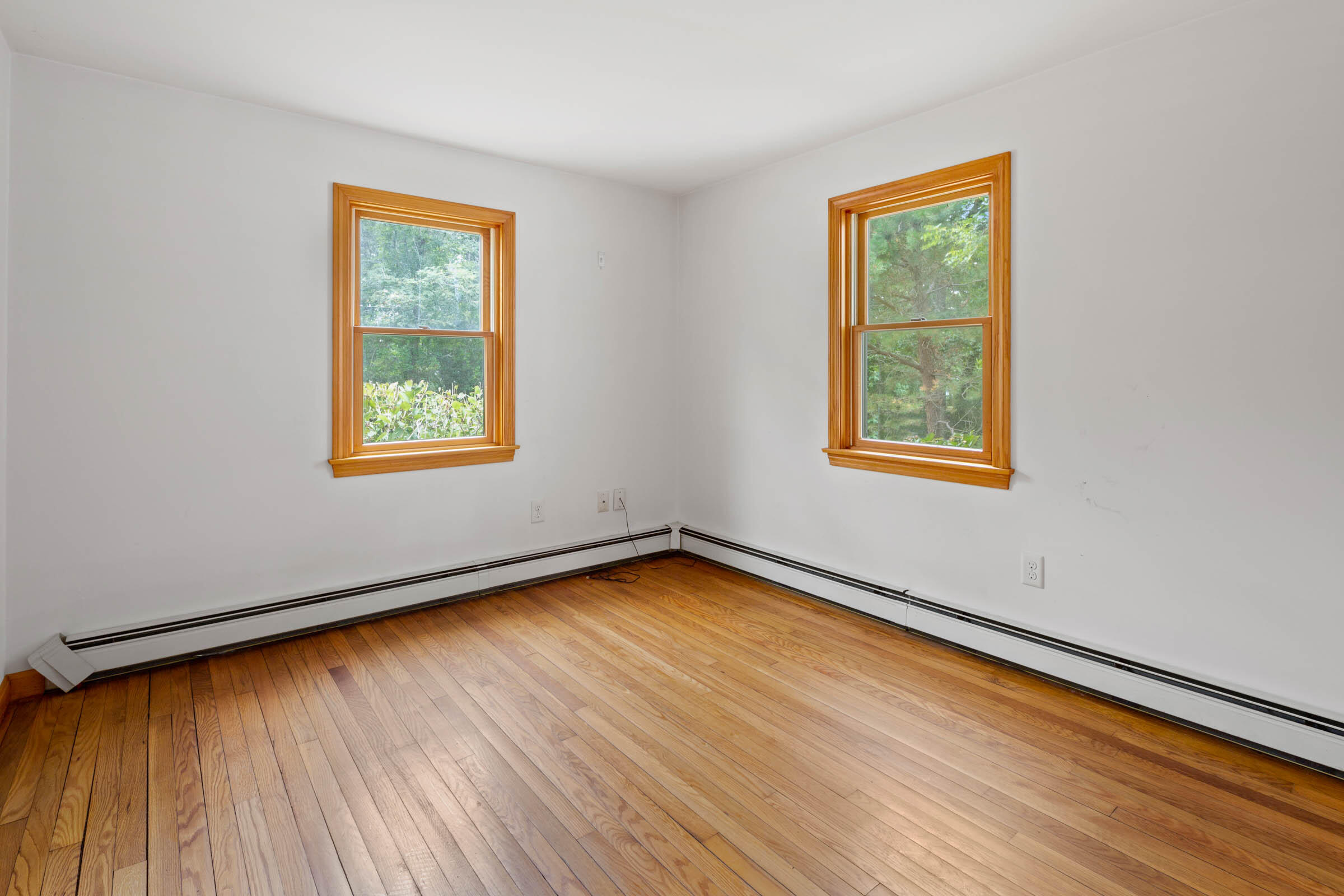143 Tonset Road Orleans, MA 02653 - Photo 14 of 18 an empty room with a window