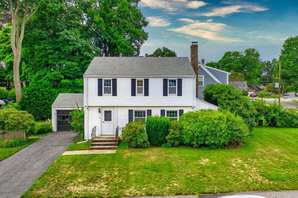 49 Fordham Road Newton, MA 02465 - Photo 1 of 13 a front view of a house with a yard