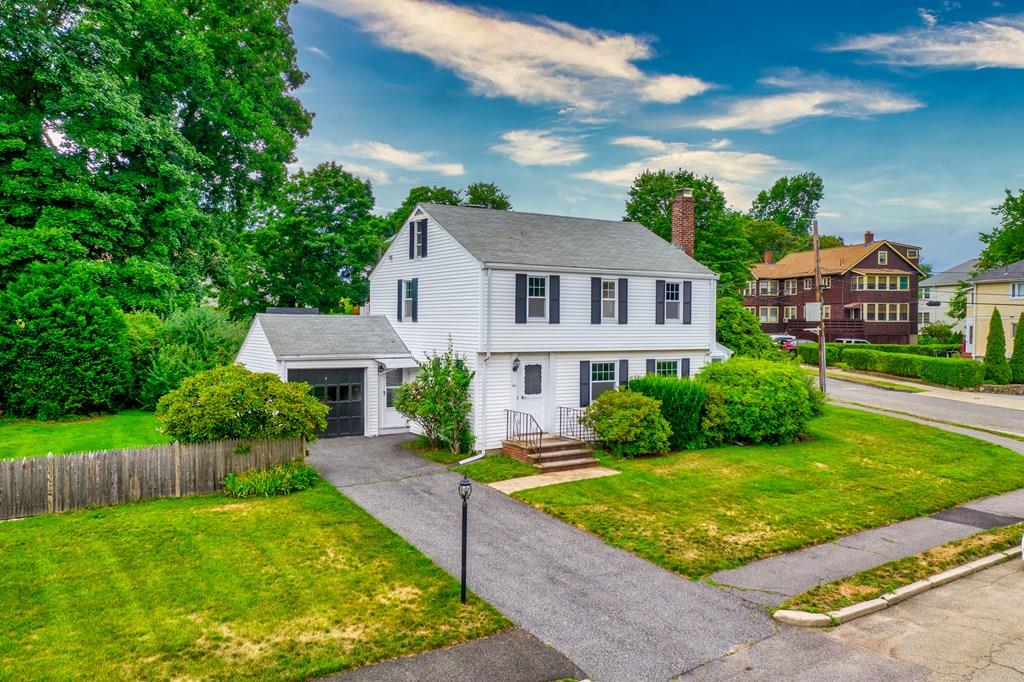 49 Fordham Road Newton, MA 02465 - Photo 2 of 13 a front view of a house with garden