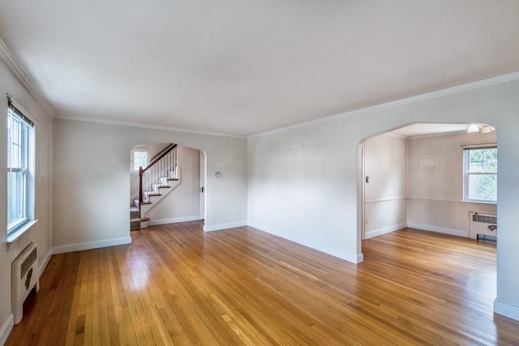 49 Fordham Road Newton, MA 02465 - Photo 4 of 13 wooden floor in an empty room with a window