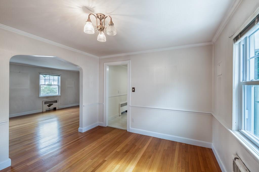 49 Fordham Road Newton, MA 02465 - Photo 5 of 13 wooden floor in an empty room with a window