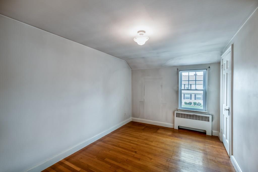 49 Fordham Road Newton, MA 02465 - Photo 9 of 13 a view of a room with wooden floor and windows