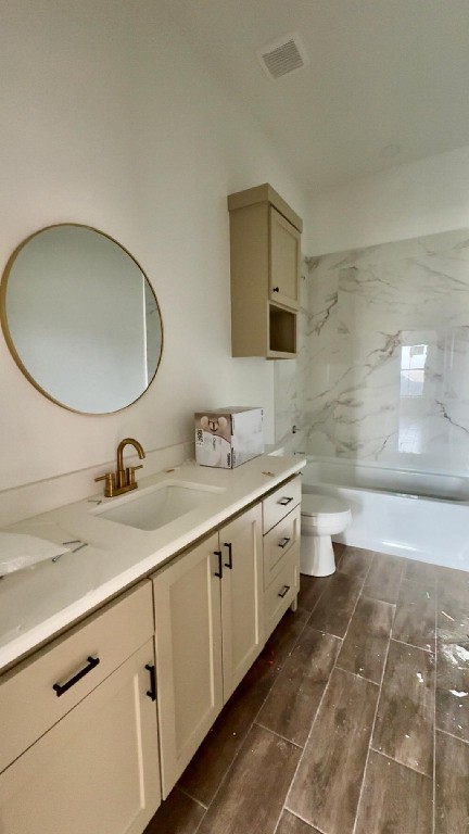 1325 Jared Lumberton, TX 77657 - Photo 13 of 23 a spacious bathroom with a double vanity sink toilet and a mirror