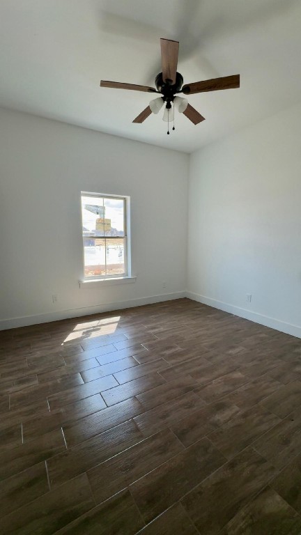 1325 Jared Lumberton, TX 77657 - Photo 19 of 23 an empty room with wooden floor fan and windows