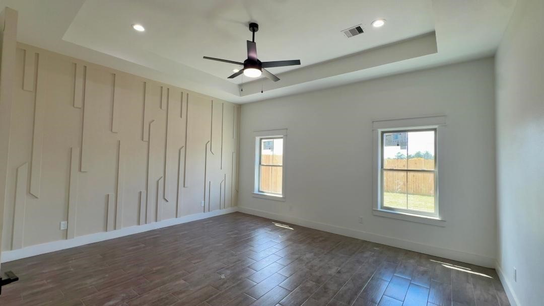 1325 Jared Lumberton, TX 77657 - Photo 23 of 23 wooden floor in an empty room with a window