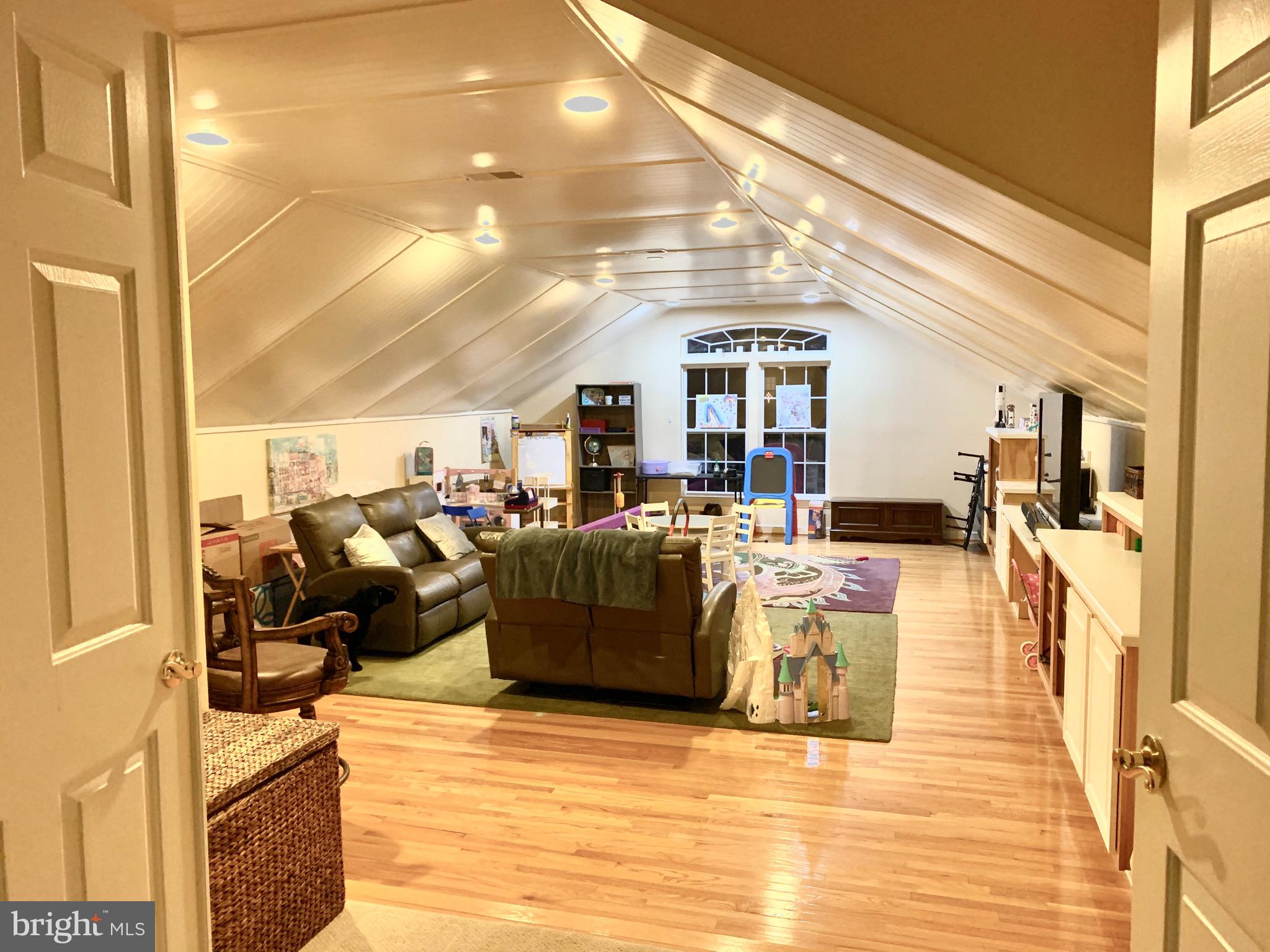 314 Powell Circle Berlin, MD 21811 - Photo 18 of 20 Upstairs Game Room with Built-ins