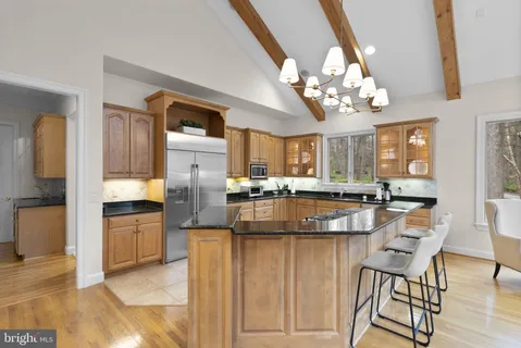 a kitchen with a stove and a sink