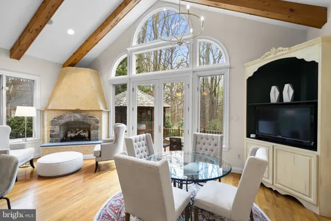 a bedroom with a bed and a mirror