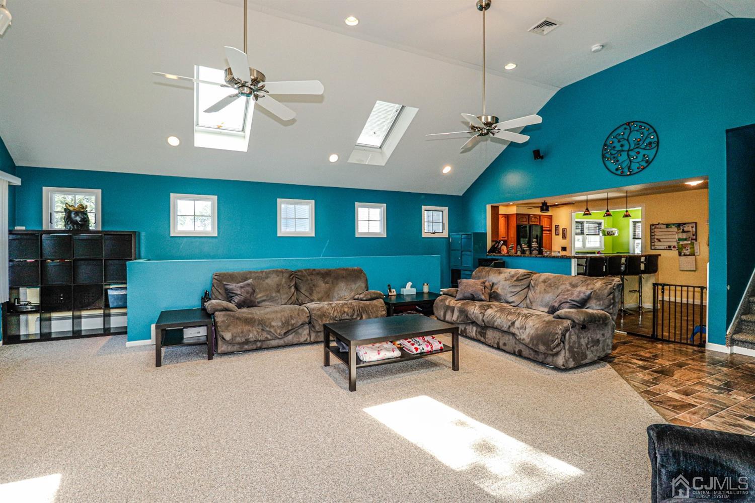 134 Normandy Road Colonia, NJ 07067 - Photo 14 of 45 a living room with furniture and a flat screen tv