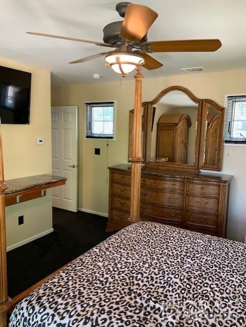 134 Normandy Road Colonia, NJ 07067 - Photo 21 of 45 a bedroom with a bed and a flat tv screen on the dresser