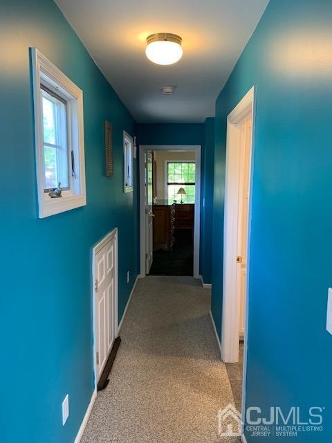 134 Normandy Road Colonia, NJ 07067 - Photo 23 of 45 a view of a hallway with windows