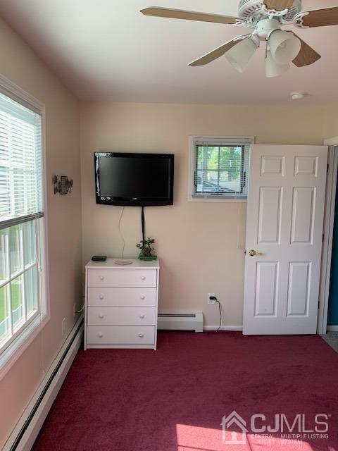 134 Normandy Road Colonia, NJ 07067 - Photo 28 of 45 an empty room with windows and fan