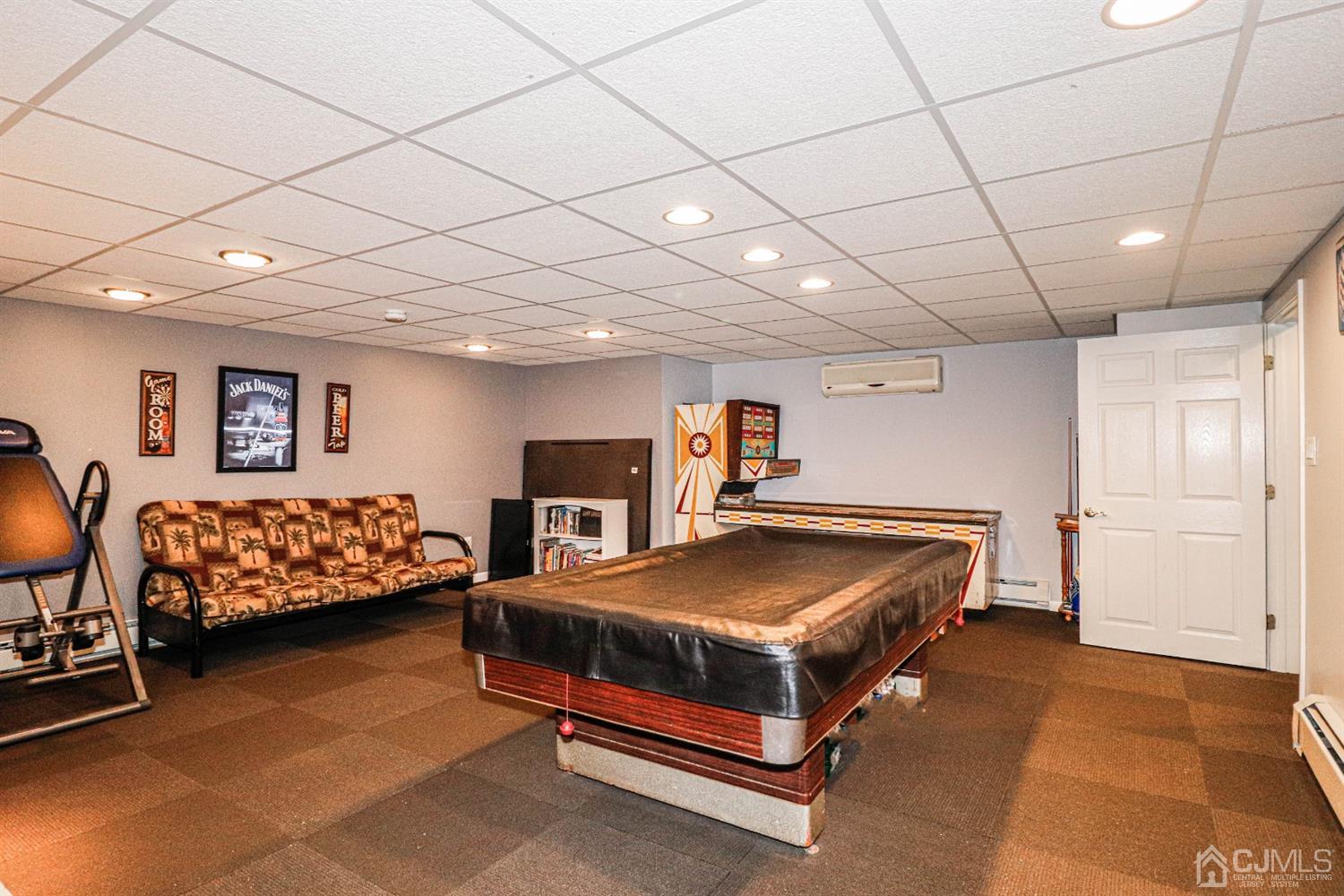 134 Normandy Road Colonia, NJ 07067 - Photo 31 of 45 a bedroom with a bed and a table in it