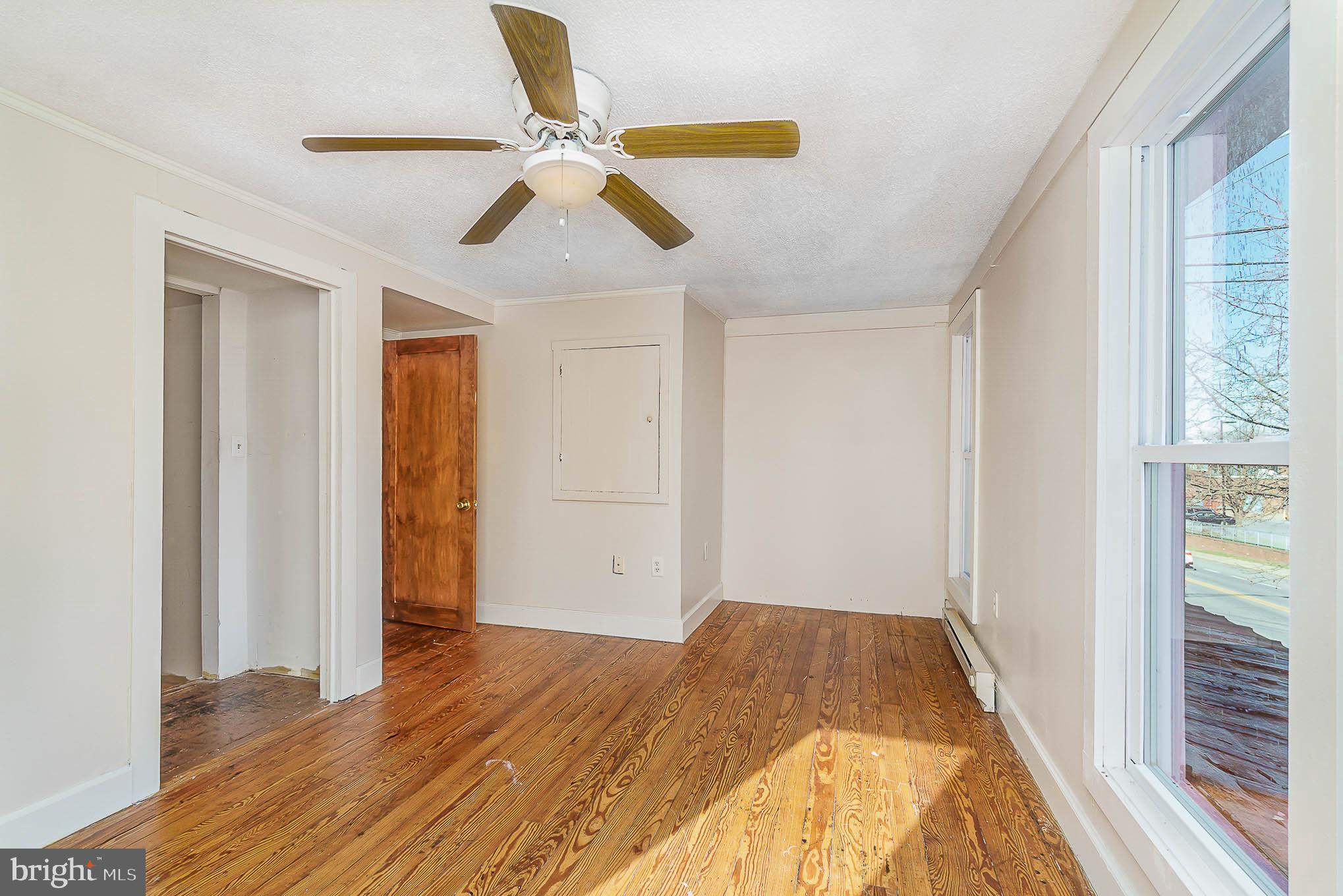 60 Trevanion Road Taneytown, MD 21787 - Photo 16 of 41 Bedroom 1 with ceiling fan and wood floor