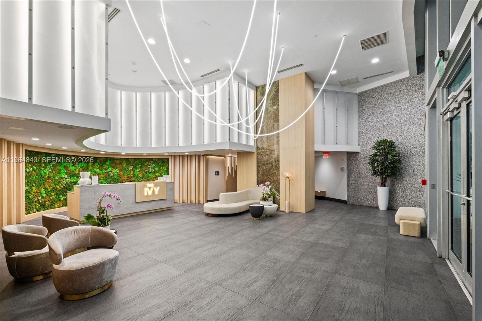 90 Southwest 3rd Street, Unit 1608 Miami, FL 33130 - Photo 19 of 32 a living room with furniture and a large window