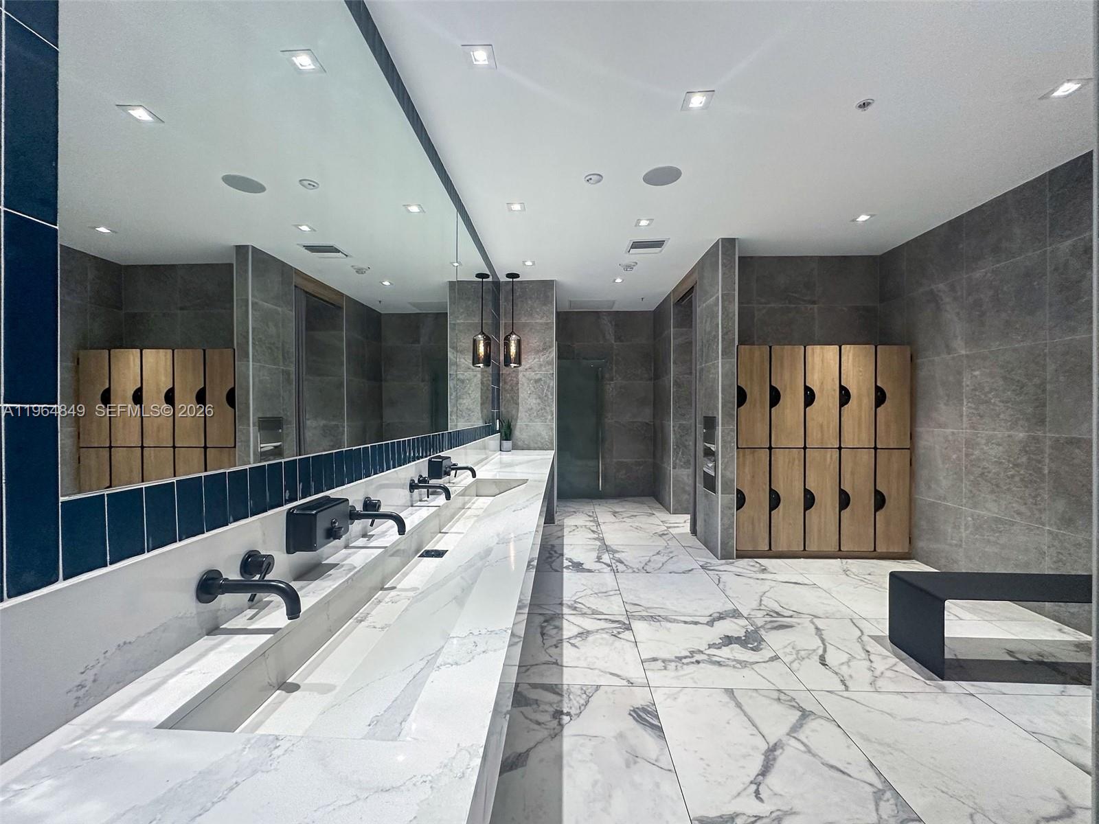 90 Southwest 3rd Street, Unit 1608 Miami, FL 33130 - Photo 28 of 32 a bathroom with a large tub shower and double vanity