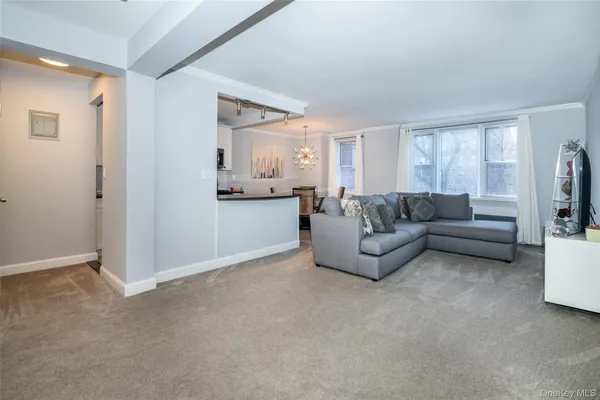 a living room with furniture and a couch