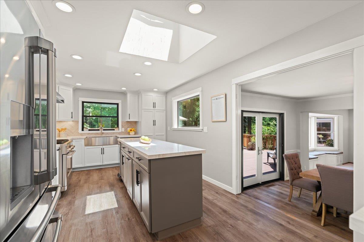 19005 Old Vineyard Road Los Gatos, CA 95033 - Photo 11 of 51 a kitchen with a sink and wooden floor