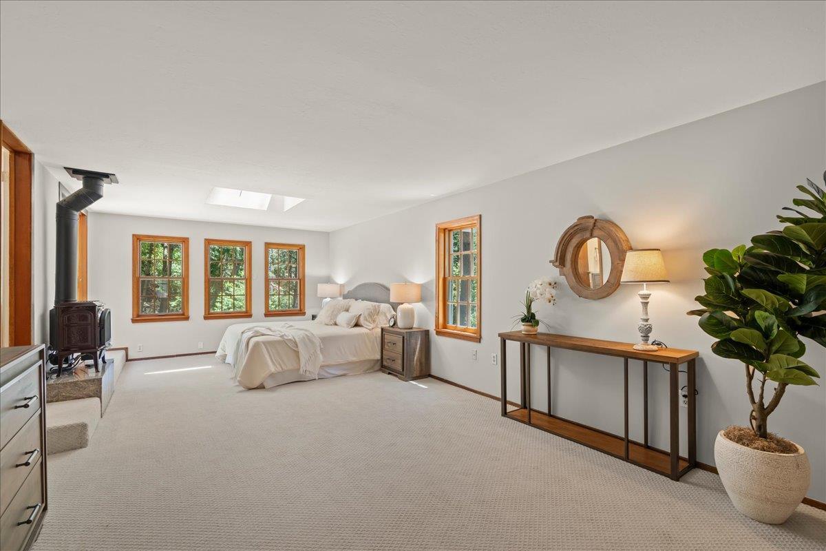 19005 Old Vineyard Road Los Gatos, CA 95033 - Photo 17 of 51 a bed room with furniture and a window