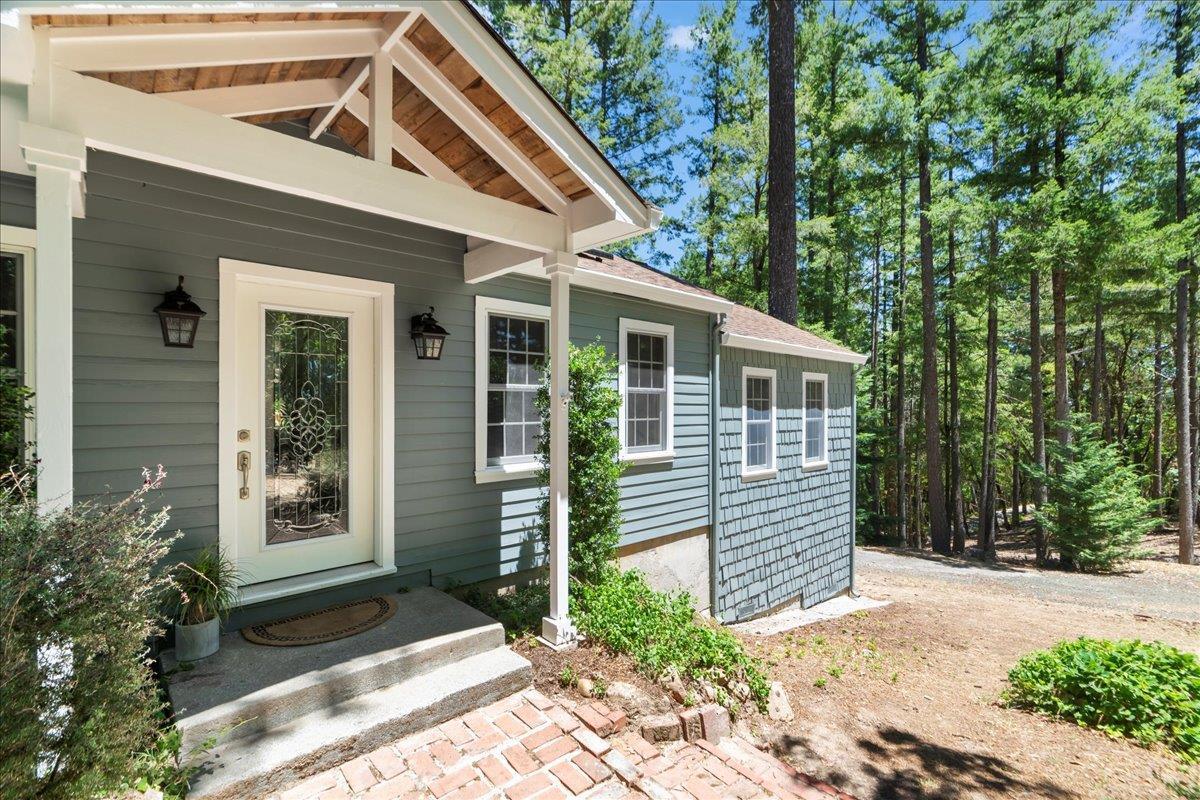 19005 Old Vineyard Road Los Gatos, CA 95033 - Photo 3 of 51 a front view of a house with a yard